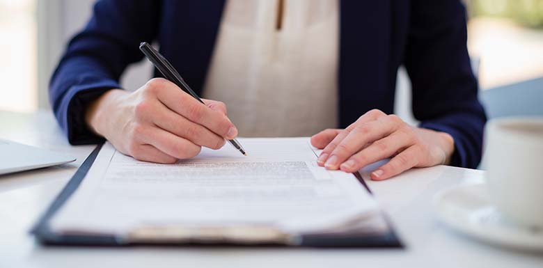 Woman filling out paperwork